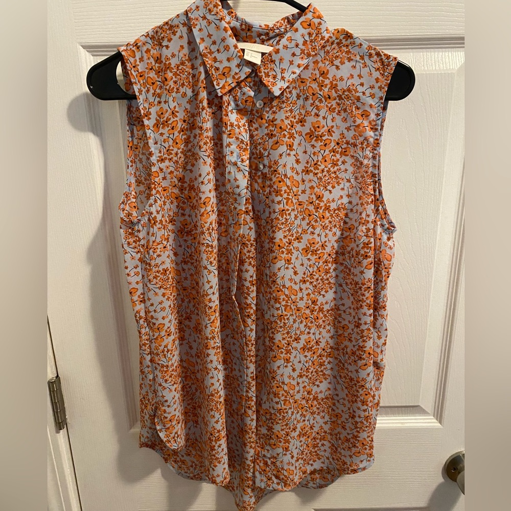 H&M. Sleeveless floral blouse.